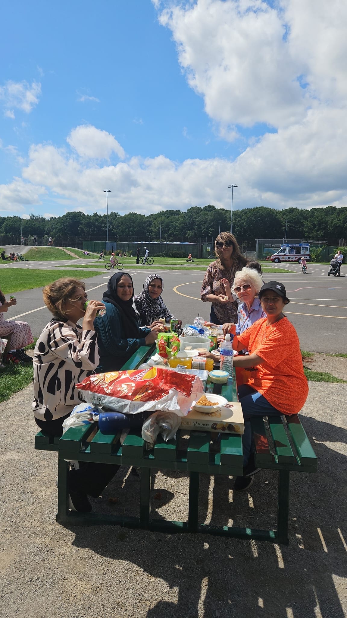image of attendees enjoying a picnic